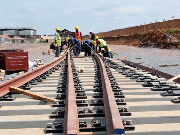 fixing railway sleepers