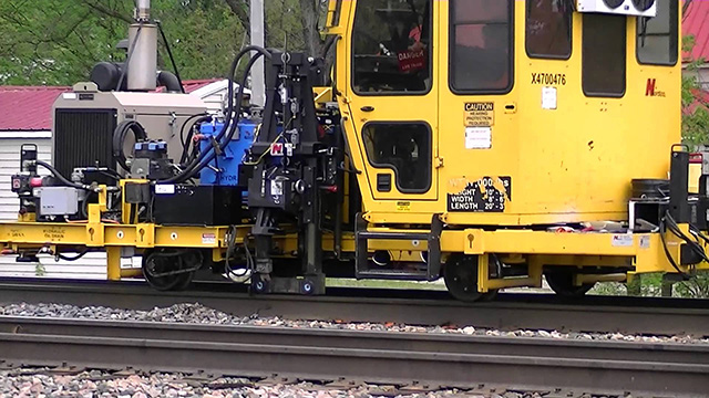railroad spike puller machine